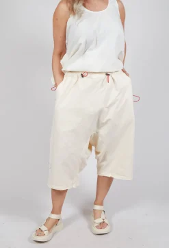Cropped Drop-Crotch Trousers in Greige