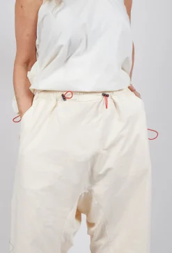 Cropped Drop-Crotch Trousers in Greige