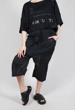 Cropped Sheer Crinkled Trousers in Black Paper