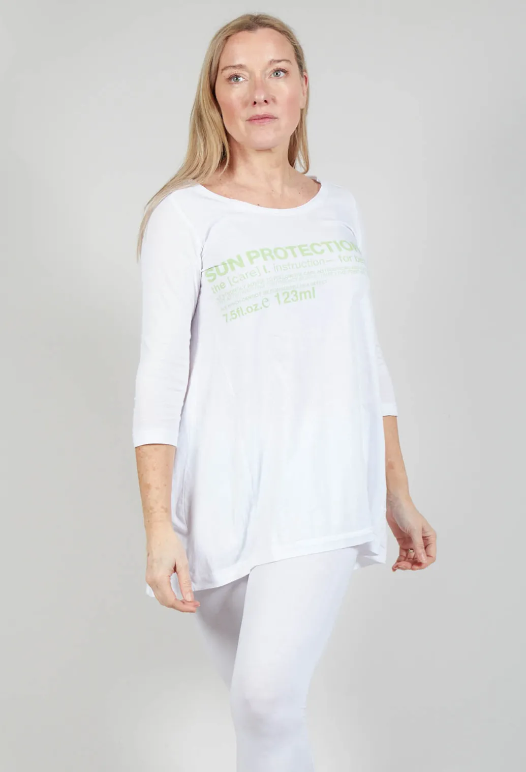 Flared Hem Jersey Top with Motif in Lime Print
