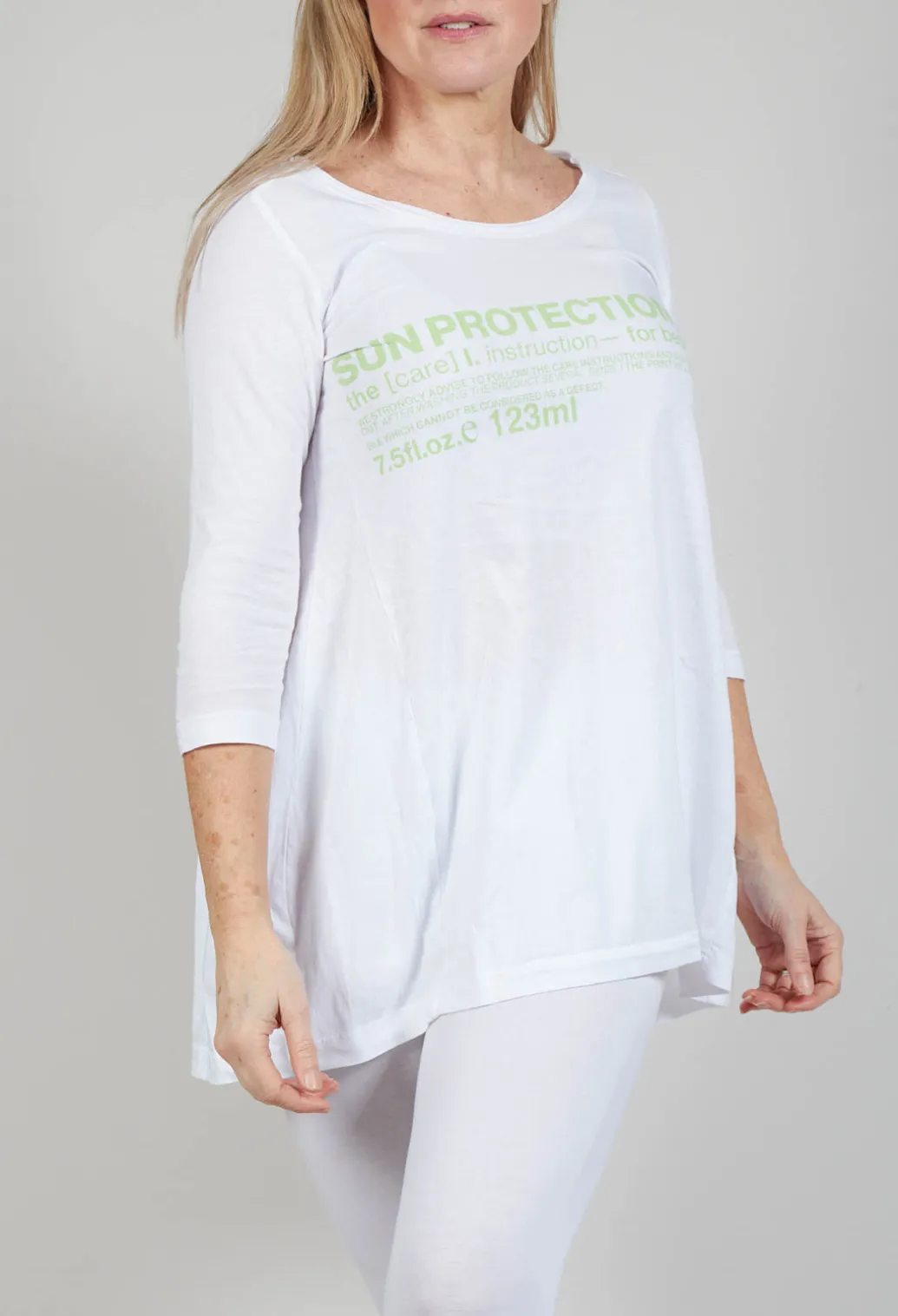 Flared Hem Jersey Top with Motif in Lime Print