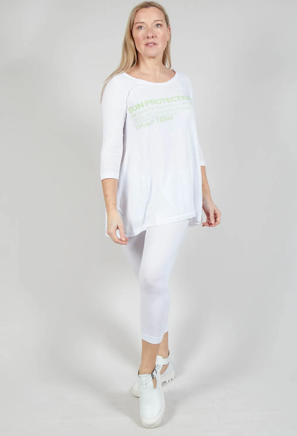 Flared Hem Jersey Top with Motif in Lime Print
