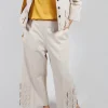 Jersey Trousers with Floral Embellishment in Sandshell