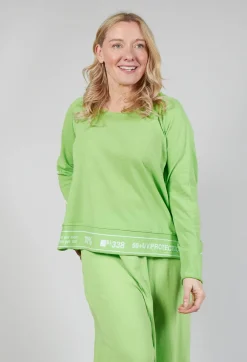 Jumper with Hemline Lettering in Lime Jacquard