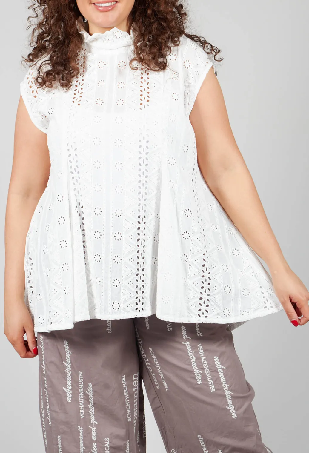 Kusfrau Top in Schnee