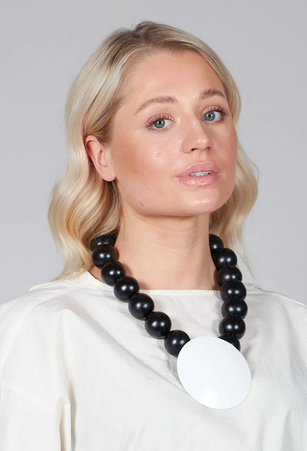 Large Beaded Necklace with Black Pendant in Black
