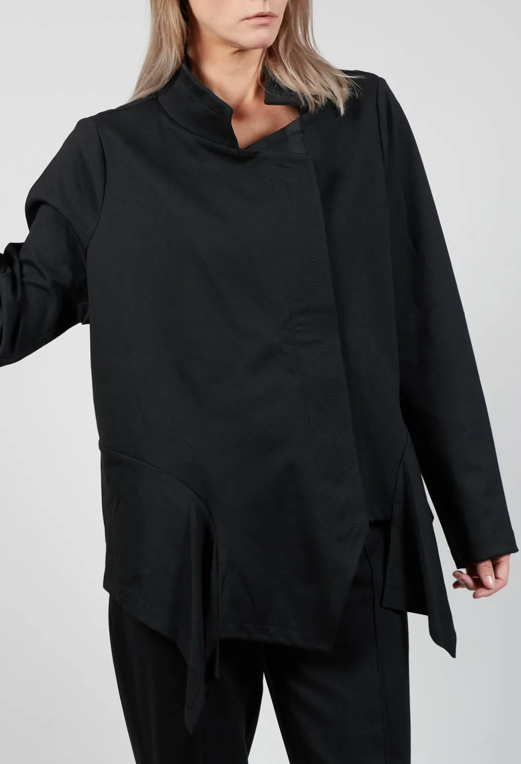 Long Sleeve Jacket with Asymmetric Peplum Hem in Black