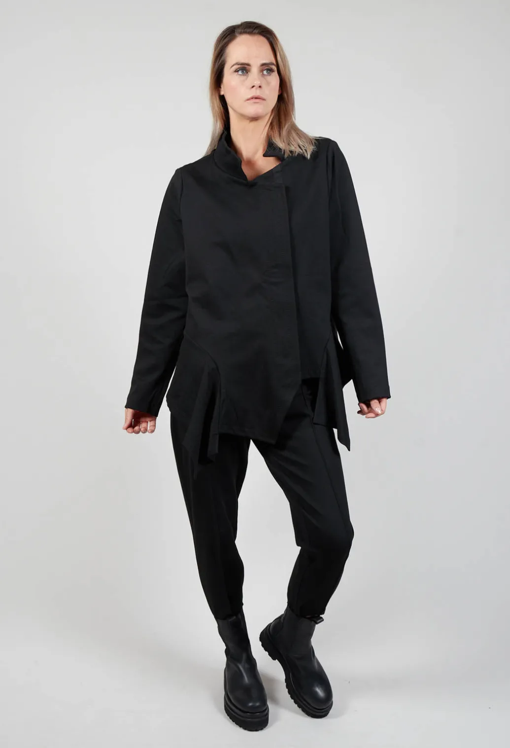 Long Sleeve Jacket with Asymmetric Peplum Hem in Black