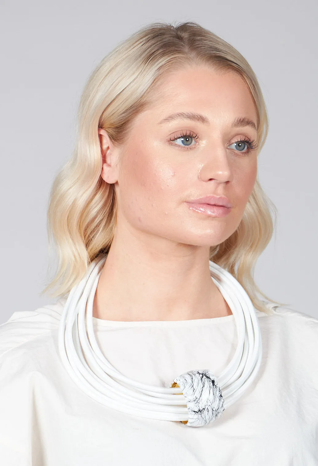 Multistrand Necklace With White Metal Pendant