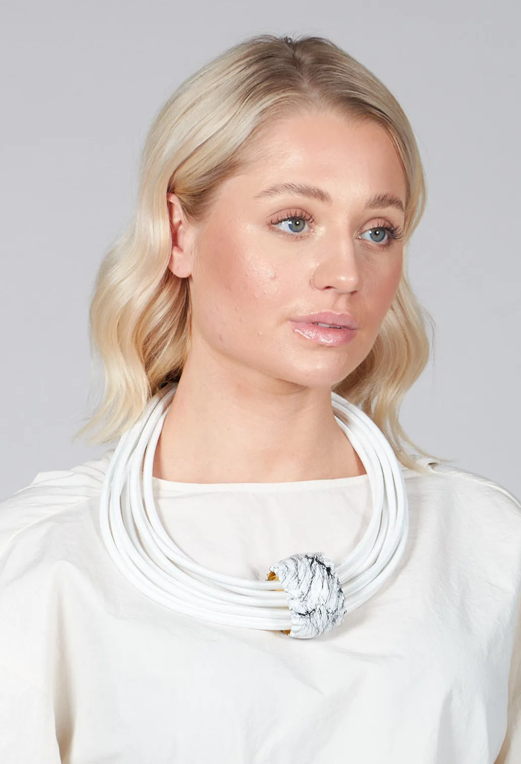 Multistrand Necklace With White Metal Pendant