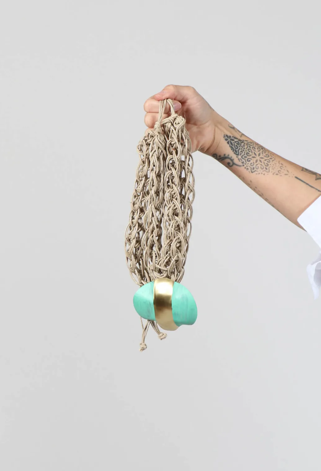 Oversized Necklace with Multiple Strings with Teal Pendant
