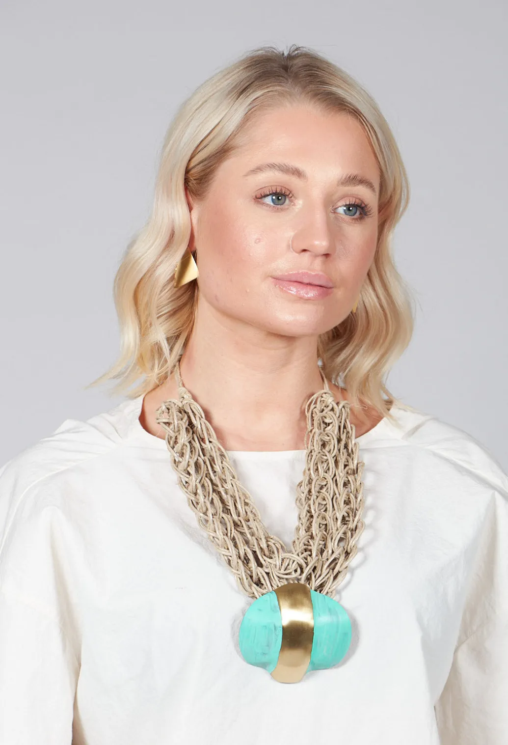 Oversized Necklace with Multiple Strings with Teal Pendant