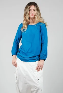 Round Neck Long Sleeved T Shirt with Bell Sleeves in Blue