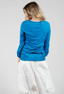 Round Neck Long Sleeved T Shirt with Bell Sleeves in Blue