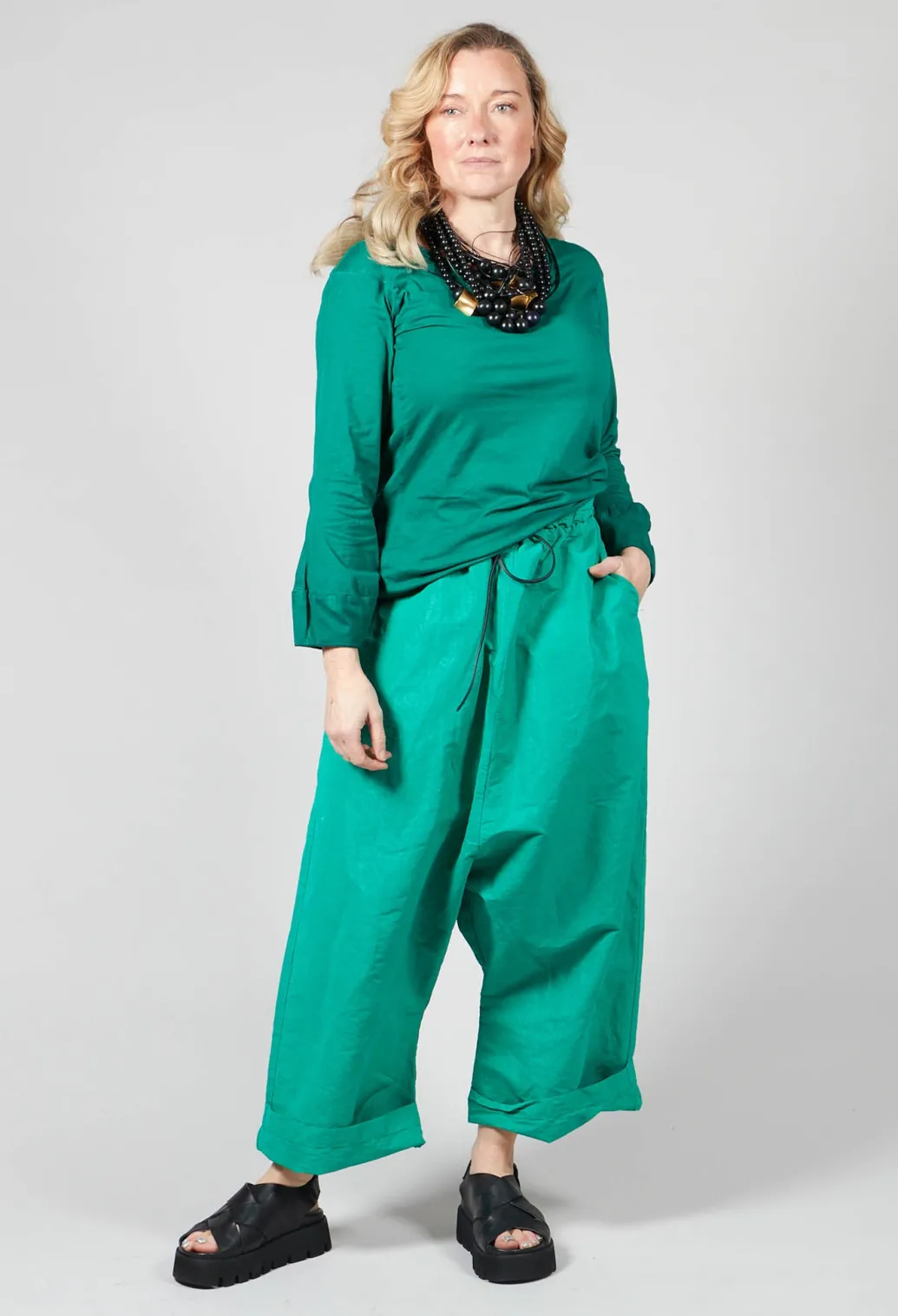 Round Neck Long Sleeved T Shirt with Bell Sleeves in Green
